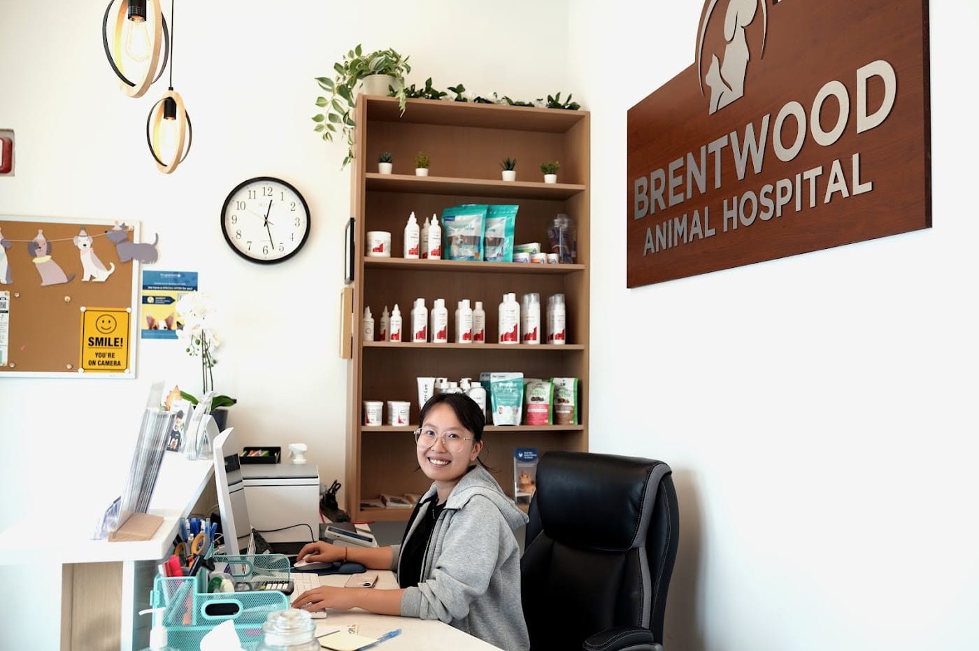 Client care team member at the front desk of Brentwood Animal Hospital in Burnaby